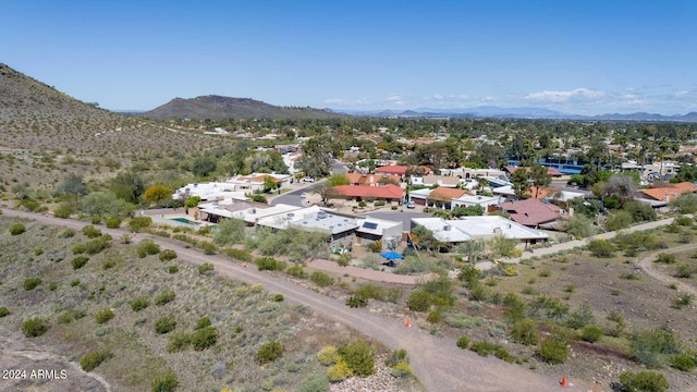 birds eye view of property featuring a mountain view