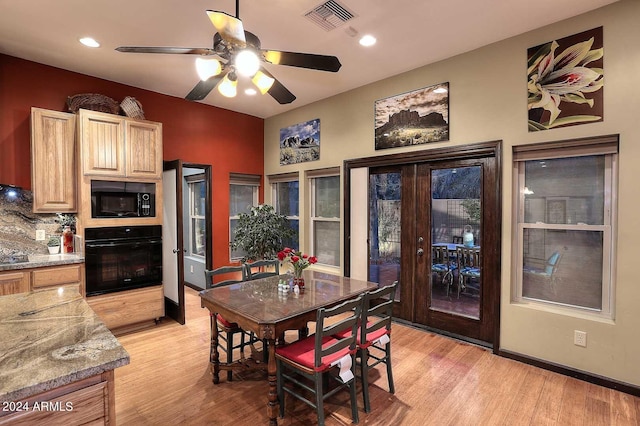 dining area featuring ceiling fan, light hardwood / wood-style floors, and french doors