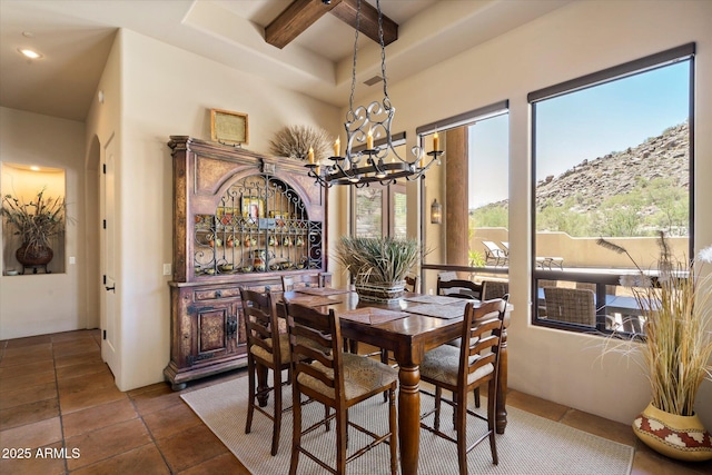 7731 E Soaring Eagle Way, Scottsdale, AZ 85266 - dining area with a chandelier, beam ceiling, coffered ceiling, recessed lighting, and a mountain view