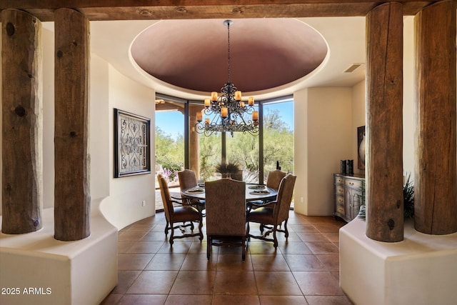7731 E Soaring Eagle Way, Scottsdale, AZ 85266 - tiled dining room with a chandelier, a tray ceiling, and a wall of windows