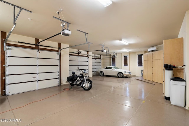 7731 E Soaring Eagle Way, Scottsdale, AZ 85266 - garage featuring a wall unit AC and a garage door opener
