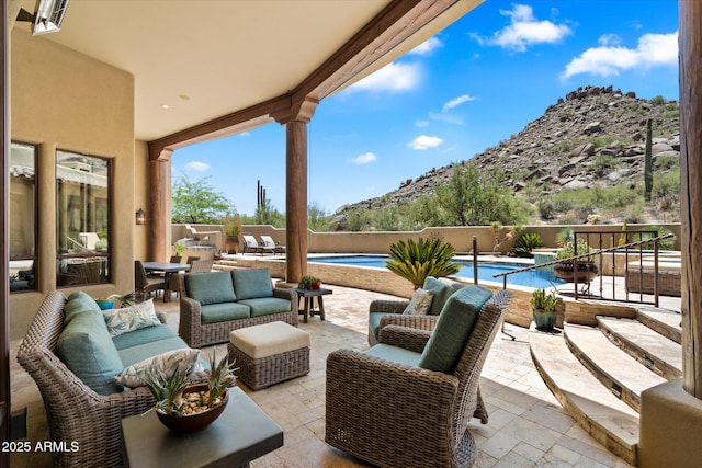 7731 E Soaring Eagle Way, Scottsdale, AZ 85266 - view of patio / terrace with an outdoor hangout area and a mountain view