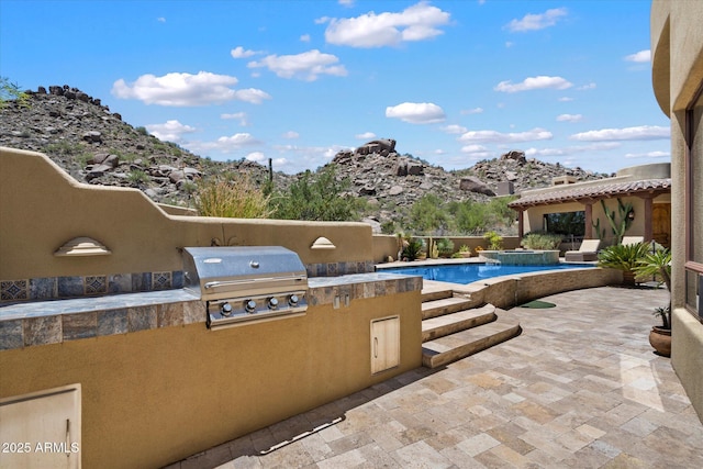 7731 E Soaring Eagle Way, Scottsdale, AZ 85266 - view of patio / terrace featuring area for grilling and an outdoor pool