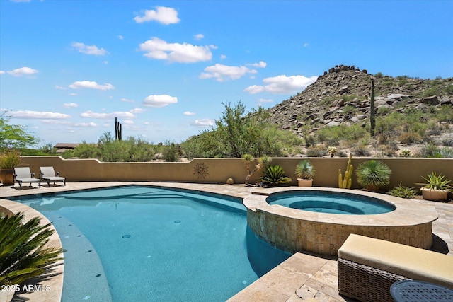 7731 E Soaring Eagle Way, Scottsdale, AZ 85266 - view of swimming pool featuring a pool with connected hot tub