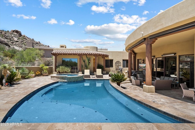 7731 E Soaring Eagle Way, Scottsdale, AZ 85266 - view of pool with a patio area and a pool with connected hot tub