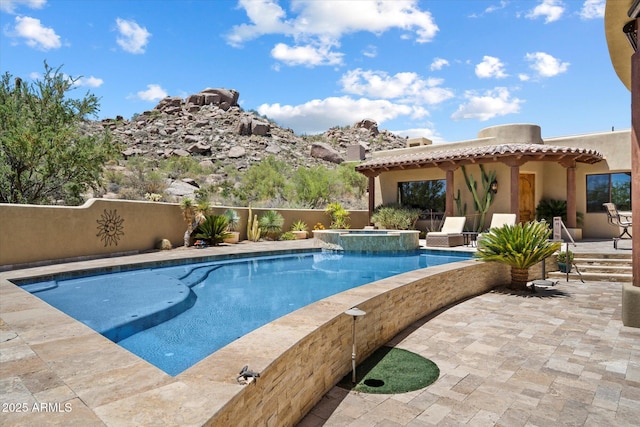 7731 E Soaring Eagle Way, Scottsdale, AZ 85266 - view of swimming pool with a patio area and an in-ground hot tub