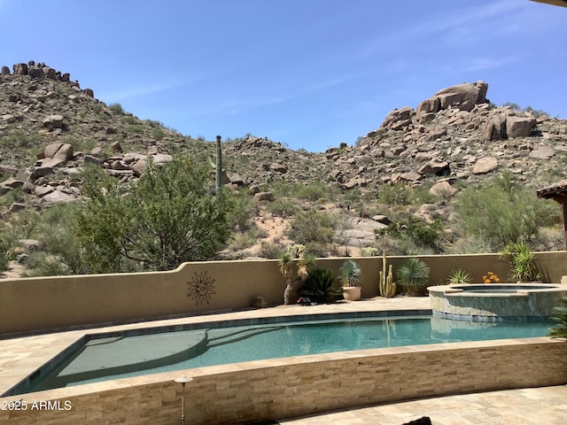 7731 E Soaring Eagle Way, Scottsdale, AZ 85266 - outdoor pool with an in-ground hot tub