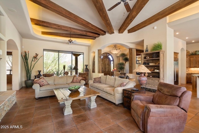 7731 E Soaring Eagle Way, Scottsdale, AZ 85266 - tiled living room featuring arched walkways, ceiling fan, beamed ceiling, and recessed lighting