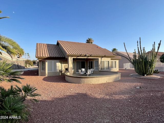 rear view of house with a patio area