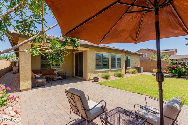 20603 W Alsap Rd, Buckeye, AZ 85396 - view of patio / terrace with an outdoor hangout area and central AC
