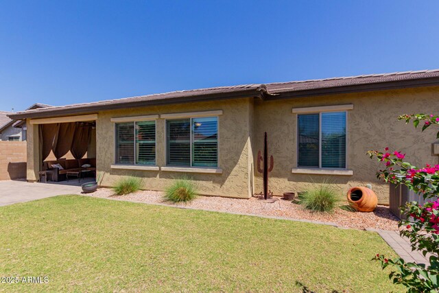 20603 W Alsap Rd, Buckeye, AZ 85396 - view of front facade featuring a patio area and stucco siding