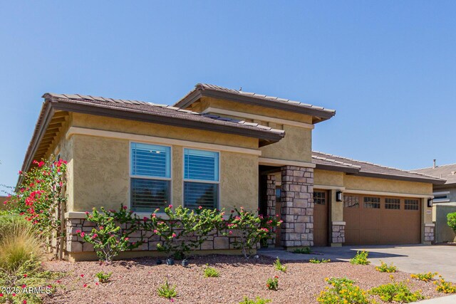 20603 W Alsap Rd, Buckeye, AZ 85396 - prairie-style house with an attached garage, stucco siding, driveway, and a tile roof