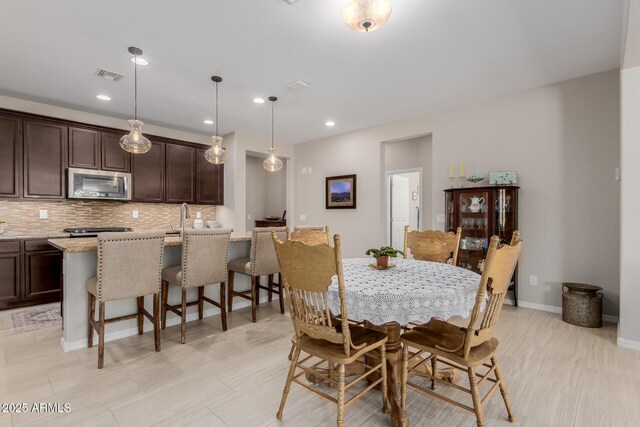 20603 W Alsap Rd, Buckeye, AZ 85396 - dining room with recessed lighting and baseboards