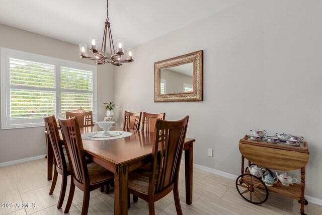 20603 W Alsap Rd, Buckeye, AZ 85396 - dining area with a chandelier and baseboards