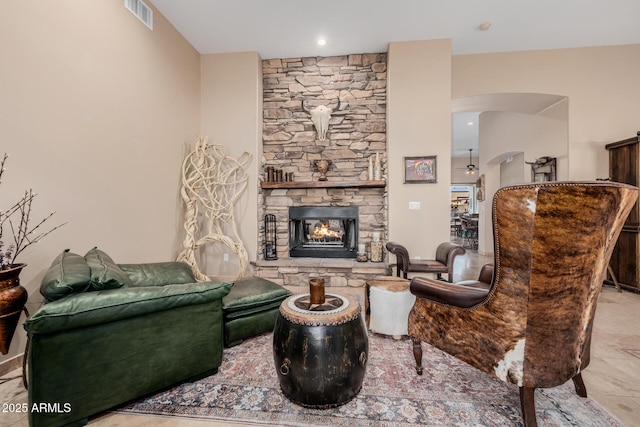 38106 N 2nd Ln, Phoenix, AZ 85086 - living area featuring arched walkways and a stone fireplace