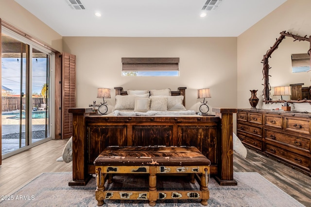 38106 N 2nd Ln, Phoenix, AZ 85086 - bedroom featuring access to outside, wood finished floors, and recessed lighting