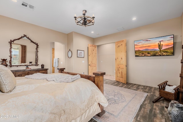 38106 N 2nd Ln, Phoenix, AZ 85086 - bedroom with arched walkways, wood finished floors, a chandelier, and recessed lighting