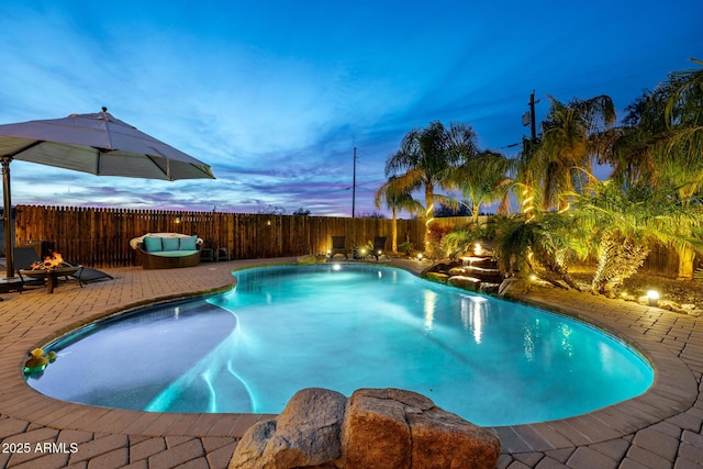 38106 N 2nd Ln, Phoenix, AZ 85086 - pool at dusk with a patio, a fenced backyard, and an outdoor fire pit