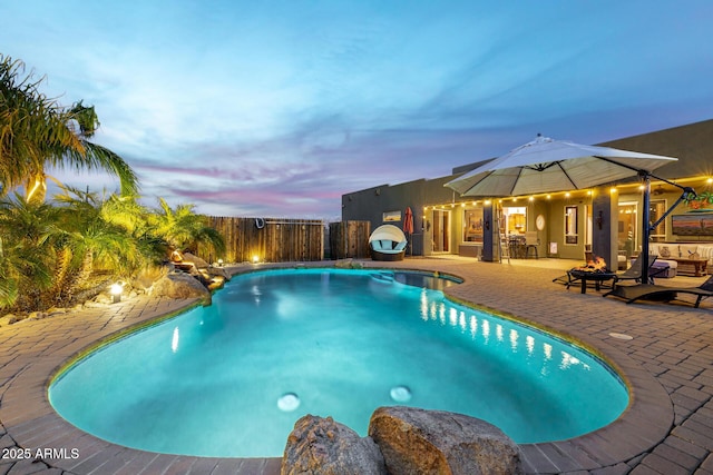 38106 N 2nd Ln, Phoenix, AZ 85086 - pool at dusk with a patio area and a fenced backyard