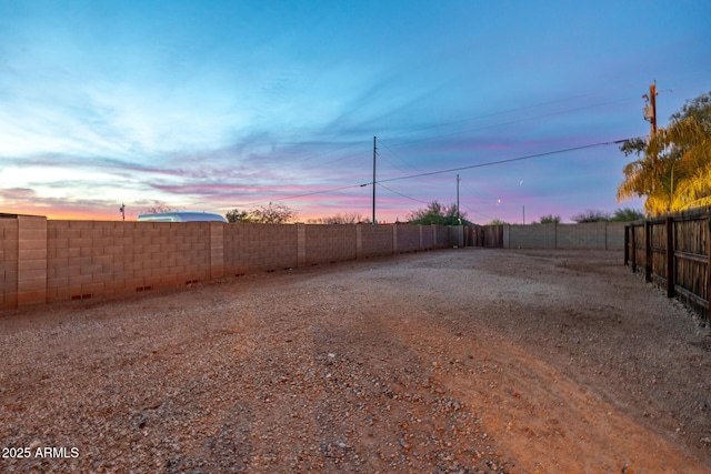38106 N 2nd Ln, Phoenix, AZ 85086 - yard at dusk with a fenced backyard