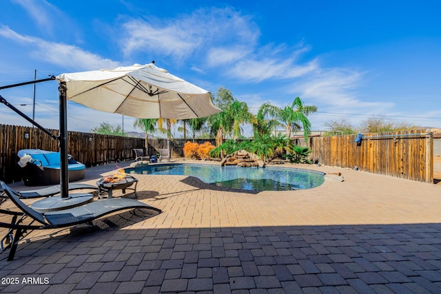 38106 N 2nd Ln, Phoenix, AZ 85086 - view of swimming pool featuring a fire pit, a patio area, and a fenced backyard
