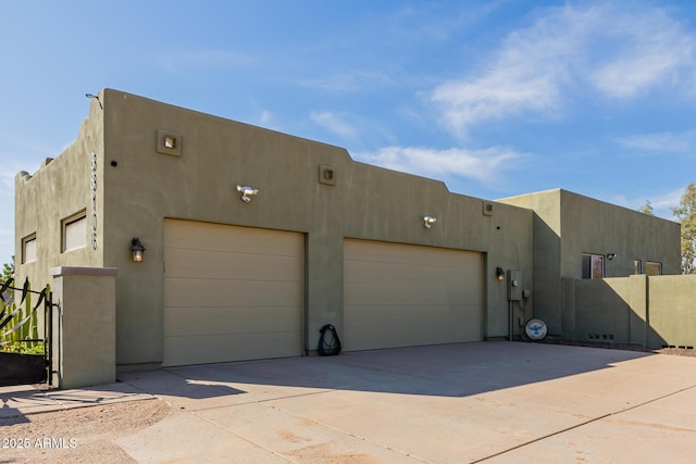 38106 N 2nd Ln, Phoenix, AZ 85086 - view of front of house with concrete driveway, a garage, and stucco siding