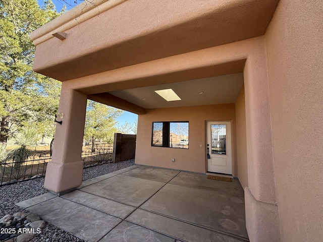 view of patio with fence