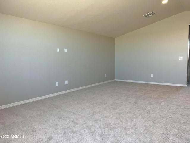 unfurnished room featuring carpet