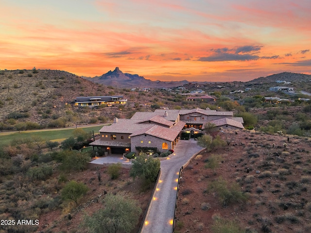 aerial view at dusk with a mountain view