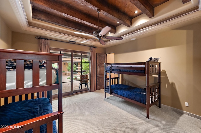 carpeted bedroom featuring access to outside, ceiling fan, beamed ceiling, and wood ceiling