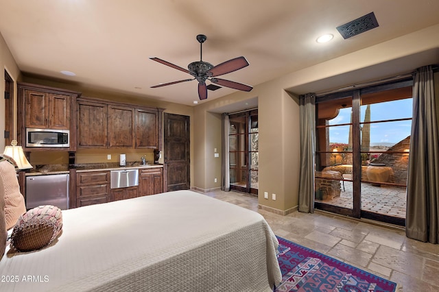 bedroom with access to exterior and ceiling fan