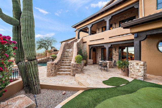 view of patio / terrace featuring a balcony