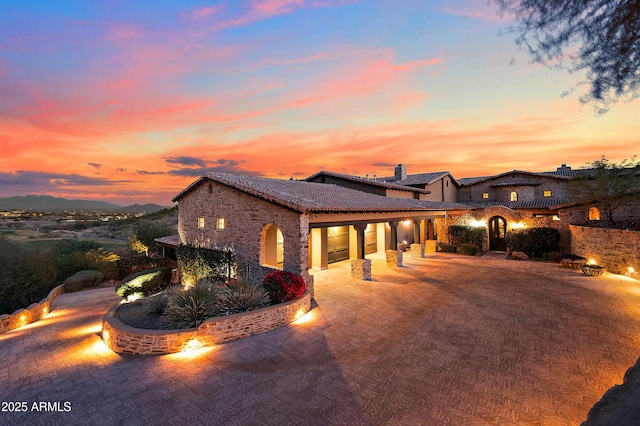 view of front of house featuring a mountain view