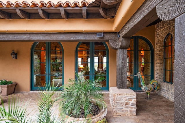 view of exterior entry with french doors