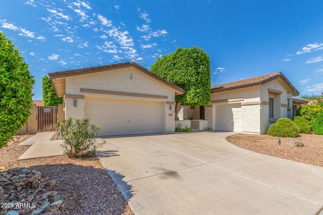 ranch-style home with a garage