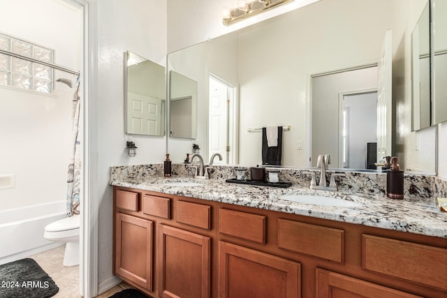 full bathroom featuring tile patterned floors, vanity, toilet, and shower / tub combo with curtain