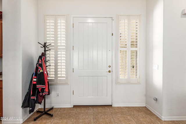 view of tiled foyer entrance