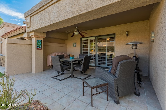 view of patio / terrace with ceiling fan