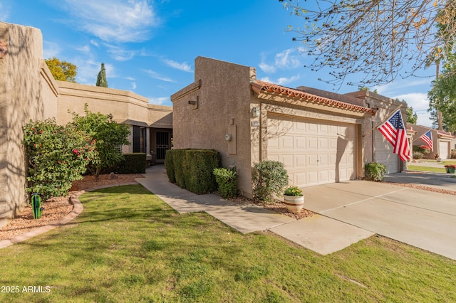 view of property exterior with a yard and a garage