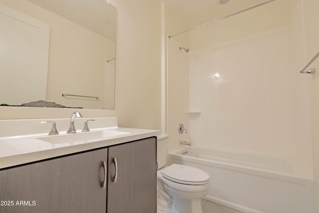 full bathroom featuring toilet, tile patterned flooring, tub / shower combination, and vanity