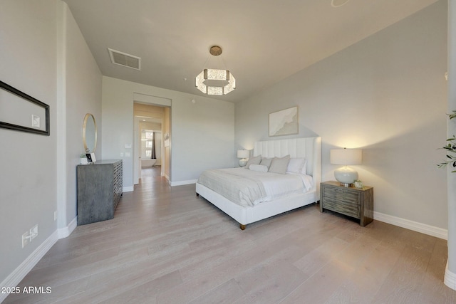 bedroom featuring light hardwood / wood-style flooring