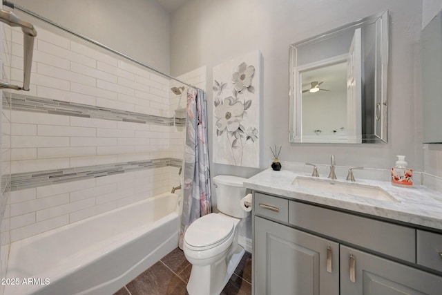 full bathroom with toilet, tile patterned flooring, shower / bath combination with curtain, ceiling fan, and vanity