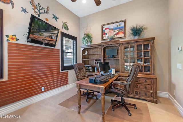 home office with ceiling fan and light colored carpet