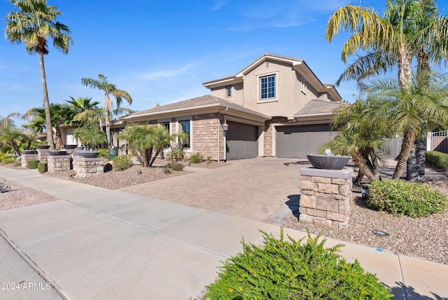 view of front of property featuring a garage