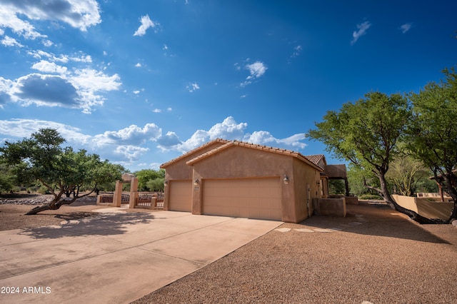 view of home's exterior featuring a garage