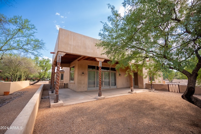 back of house featuring a patio