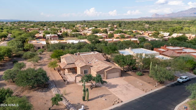 drone / aerial view featuring a mountain view