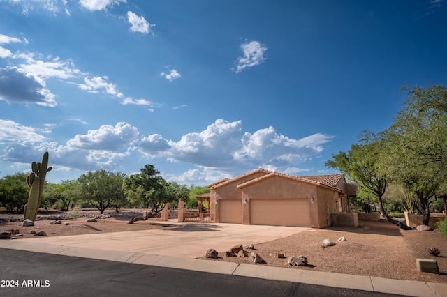view of front of property featuring a garage