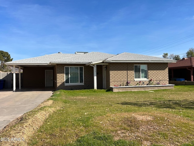 single story home with a carport and a front yard