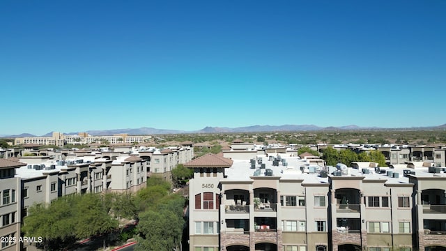 drone / aerial view featuring a mountain view